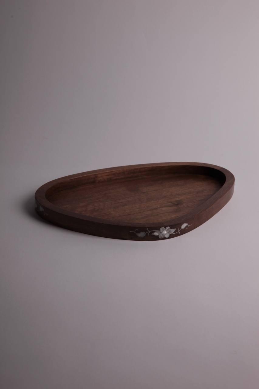 wooden tray. shape: curved pattern