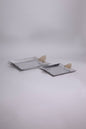 Metal tray with golden handle