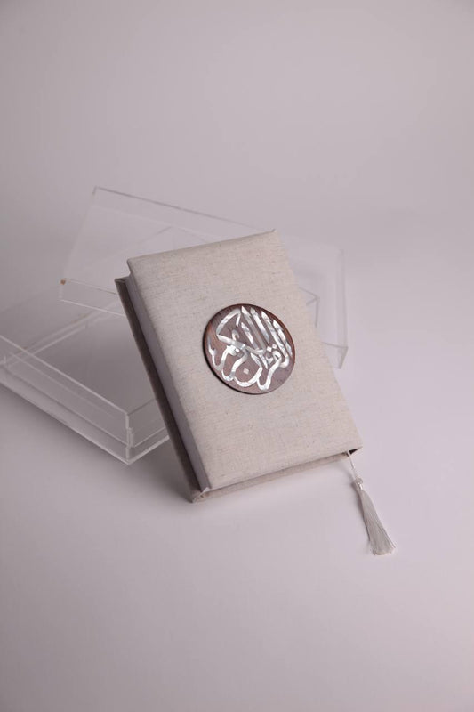 Small beige quran with round wooden msadaf