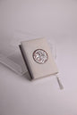Big beige quran with round wooden msadaf