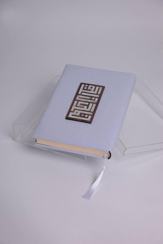 Big blue quran with rectangular wooden msadaf